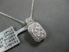ESTATE 1.08CT DIAMOND 18KT WHITE GOLD 3D ROUND INVISIBLE SQUARE FLOATING PENDANT