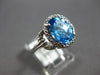 3.34CT DIAMOND & AAA BLUE TOPAZ 14KT WHITE GOLD OVAL & ROUND FUN LOVE KNOT RING