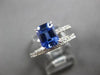 1.51CT DIAMOND & AAA SAPPHIRE 18KT WHITE GOLD BAGUETTE & ROUND ENGAGEMENT RING