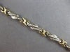 LONG 1.02CT DIAMOND 14KT 2 TONE GOLD BAGUETTE MULTI LEAF X LOVE TENNIS BRACELET