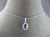 1.28CT DIAMOND & AAA CEYLON SAPPHIRE 14KT WHITE GOLD OVAL HALO FLOATING PENDANT