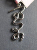 ESTATE .16CT DIAMOND 14KT WHITE GOLD 3D SCRIPT LOVE FLOATING PENDANT