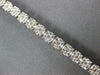 ESTATE WIDE 3.05CT DIAMOND 14KT WHITE GOLD CLUSTER ROUND 4 PRONG TENNIS BRACELET