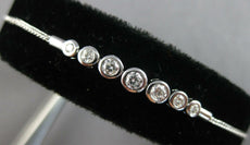 .34CT DIAMOND 14KT WHITE GOLD 7 STONE GRADUATING BEZEL ADJUSTABLE LOVE BRACELET