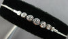 .34CT DIAMOND 14KT WHITE GOLD 7 STONE GRADUATING BEZEL ADJUSTABLE LOVE BRACELET
