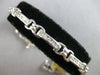 ESTATE LONG 2.60CT DIAMOND 14KT WHITE GOLD ROUND CHANNEL X LOVE TENNIS BRACELET