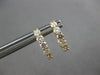 ESTATE .62CT DIAMOND 18KT YELLOW GOLD ROUND 5 STONE SHARED PRONG HUGGIE EARRINGS