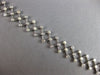 ESTATE .52CT DIAMOND 14K WHITE GOLD BEZEL ETOILE CRISS CROSS FUN TENNIS BRACELET