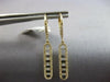 LONG .55CT DIAMOND 14KT YELLOW GOLD ROUND & BAGUETTE ELONGATED OVAL FUN EARRINGS