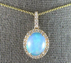 2.36CT DIAMOND & AAA AUSTRALIAN OPAL 14KT YELLOW GOLD OVAL HALO FLOATING PENDANT