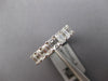 LARGE 5.11CT DIAMOND 18KT WHITE GOLD EMERALD CUT SHARED PRONG ANNIVERSARY RING