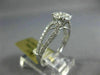 ESTATE .66CT DIAMOND 14KT WHITE GOLD 3D CLASSIC INVISIBLE ROUND ENGAGEMENT RING