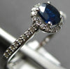 .63CT DIAMOND & AAA SAPPHIRE 14KT WHITE GOLD OVAL & ROUND HALO FRIENDHSHIP RING