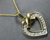 ESTATE .30CT DIAMOND 14KT 2 TONE GOLD CLASSIC OPEN HEART X LOVE FLOATING PENDANT
