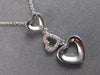 .06CT DIAMOND 14KT WHITE GOLD 3D OPEN HEART JOURNEY PAST PRESENT FUTURE PENDANT
