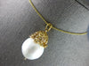LARGE .10CT DIAMOND & AAA SOUTH SEA PEARL 18KT YELLOW GOLD MULTI FLOWER PENDANT