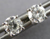 ESTATE .58CT DIAMOND 14KT WHITE GOLD 3D CLASSIC ROUND SOLITAIRE STUD EARRINGS