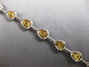 WIDE & LONG 6.29CT WHITE & FANCY YELLOW DIAMOND 18KT 2 TONE GOLD TENNIS BRACELET