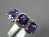 1.57CT DIAMOND & AAA AMETHYST 14KT WHITE GOLD CUSHION & ROUND 3 STONE HALO RING