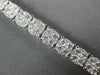 ESTATE WIDE 5.52CT DIAMOND 18KT WHITE GOLD 3D CLUSTER ROUND TENNIS BRACELET