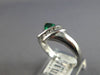 .43CT DIAMOND & AAA EMERALD 14K WHITE GOLD TRILLION & ROUND CRISS CROSS FUN RING