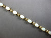 4.6CT DIAMOND & AAA OPAL 14KT YELLOW GOLD OVAL & ROUND ETERNITY BRACELET 28192