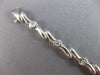 ESTATE .50CT DIAMOND 14K WHITE GOLD BEZEL ETOILE CRISS CROSS FUN TENNIS BRACELET