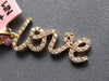 ESTATE .16CT DIAMOND 14KT ROSE GOLD 3D SCRIPT LOVE FLOATING PENDANT