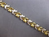ESTATE WIDE 14KT WHITE & YELLOW GOLD 3D MULTI HEART XO LOVE BRACELET