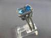 6.40CT DIAMOND & AAA BLUE TOPAZ 14KT WHITE GOLD 3D EMERALD CUT & ROUND HALO RING
