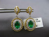 2.06CT DIAMOND & AAA EMERALD 18KT 2 TONE GOLD OVAL & ROUND HALO HANGING EARRINGS