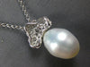 ESTATE LARGE .75CT DIAMOND & AAA SOUTH SEA PEARL 18KT WHITE GOLD FLORAL PENDANT
