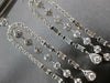 LONG 1.25CT DIAMOND 14KT WHITE GOLD ROUND & BAGUETTE HORSESHOE HANGING EARRINGS