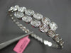 2.67CT DIAMOND 18K WHITE GOLD OVAL BEZEL INVISIBLE SEMI ETERNITY BANGLE BRACELET