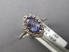 1.11CT DIAMOND & AAA TANZANITE 14KT WHITE GOLD MARQUISE & ROUND ENGAGEMENT RING