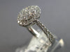 .82CT DIAMOND 18KT WHITE GOLD 3D CLASSIC ROUND CLUSTER HALO OVAL FRIENDSHIP RING