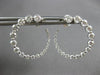 2.09CT DIAMOND 18KT WHITE GOLD GRADUATING JOURNEY SIDEWAYS HOOP HANGING EARRINGS