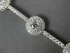 LARGE 5.01CT DIAMOND 18KT WHITE GOLD 3D ROUND DOUBLE HALO FLOWER TENNIS BRACELET