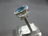 3.34CT DIAMOND & AAA BLUE TOPAZ 14KT WHITE GOLD OVAL & ROUND FUN LOVE KNOT RING