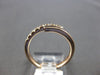 ESTATE .26CT DIAMOND 14KT ROSE GOLD 3D CLASSIC 5MM CRISS CROSS LOVE RING