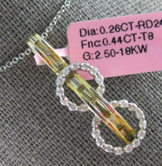 .70CT WHITE & FANCY YELLOW DIAMOND 18KT 2 TONE GOLD ROUND & BAGUETTE 3D PENDANT