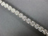 ESTATE WIDE 4.05CT DIAMOND 14KT WHITE GOLD CLUSTER ROUND 4 PRONG TENNIS BRACELET