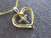 ESTATE .05CT DIAMOND 14KT YELLOW GOLD 3D CLASSIC CROSS HEART FLOATING PENDANT