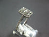 WIDE .83CT DIAMOND 18KT WHITE GOLD ROUND & BAGUETTE RECTANGULAR HALO LOVE RING