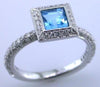 1.63CT DIAMOND & AAA BLUE TOPAZ 18KT WHITE GOLD PRINCESS & ROUND ENGAGEMENT RING