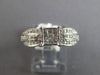.50CT DIAMOND 14KT WHITE GOLD ROUND & PRINCESS SQUARE INVISIBLE ENGAGEMENT RING