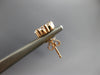 1.04CT DIAMOND 14KT ROSE GOLD 3D CLASSIC FLOWER ROUND INVISIBLE STUD EARRINGS