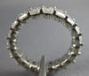 LARGE 4.08CT DIAMOND 18KT WHITE GOLD EMERALD CUT SHARED PRONG ANNIVERSARY RING
