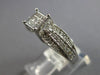 .50CT DIAMOND 14KT WHITE GOLD ROUND & PRINCESS SQUARE INVISIBLE ENGAGEMENT RING