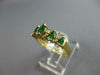 ESTATE .68CT DIAMOND & AAA EMERALD 14KT YELLOW GOLD GRADUATING ANNIVERSARY RING